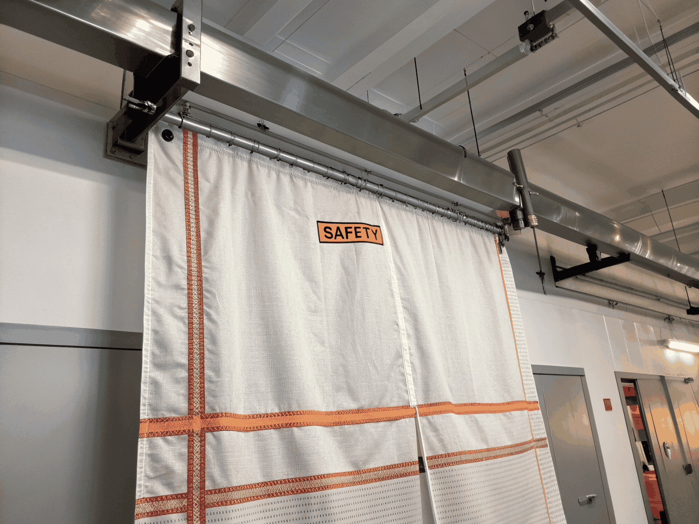 Curtain blade industrial fire damper with spring release and thermal link