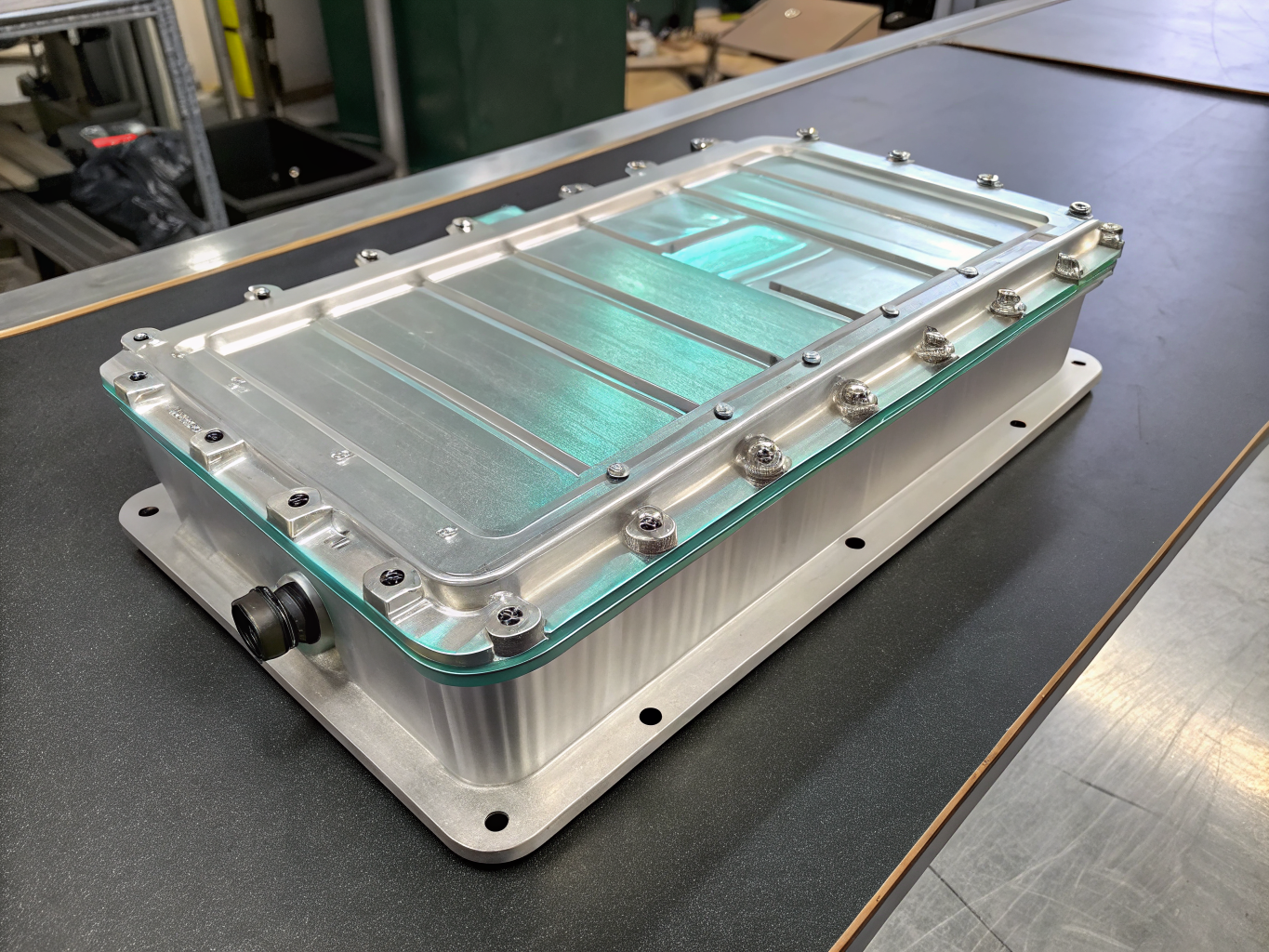 Lightweight aluminum EV battery tray enclosure with thermal channels