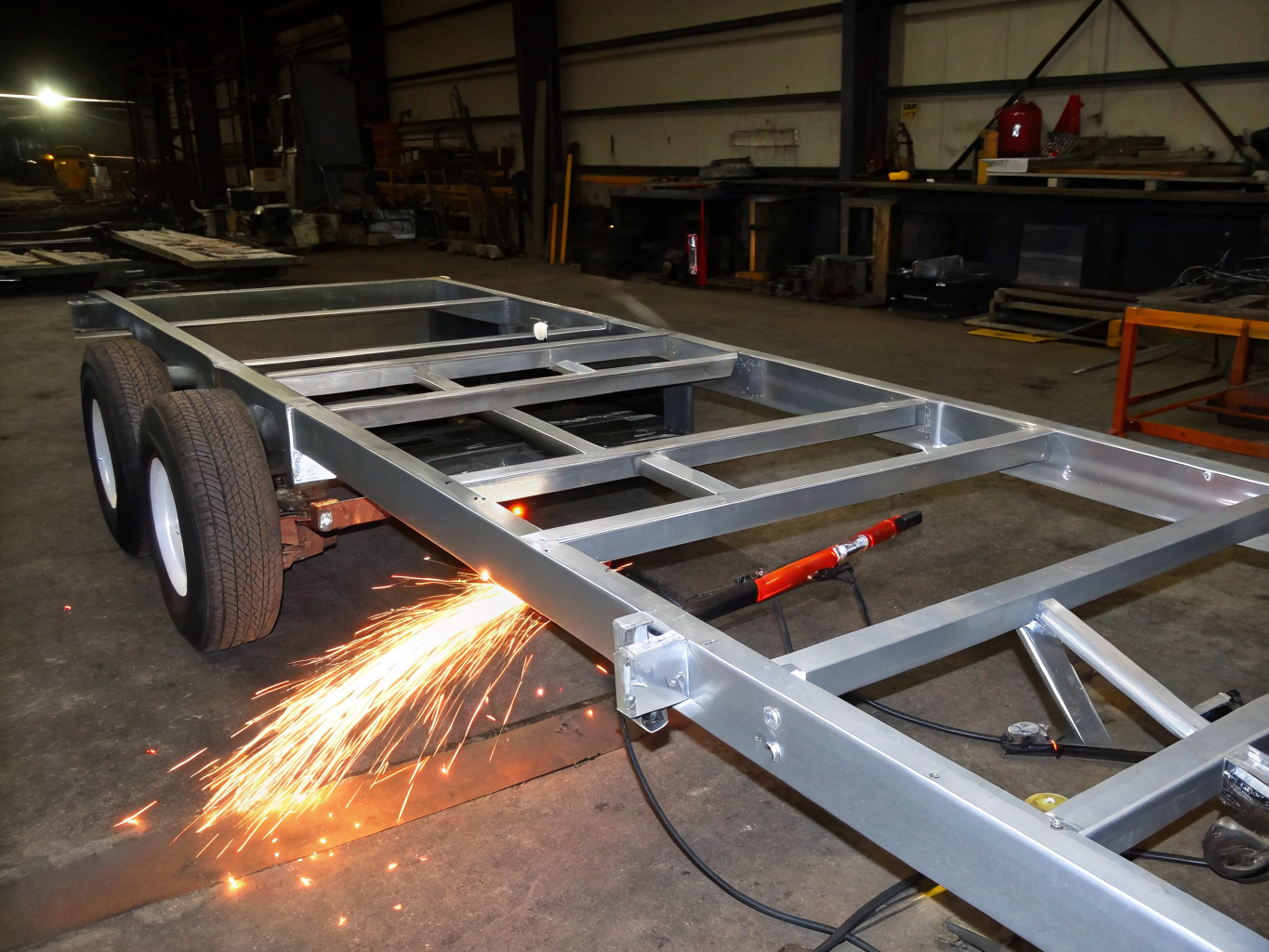 Robotic welded chassis frame reinforcement bracket