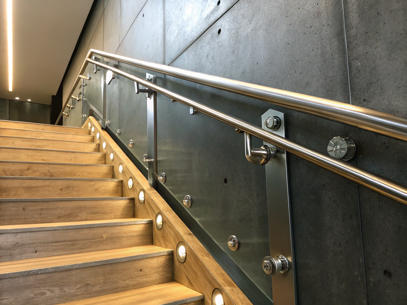 Safety steel stair treads and architectural guardrail panels